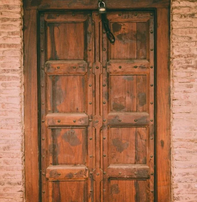 wooden door with padlock
