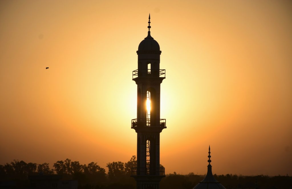 silhouette of tower during sunset