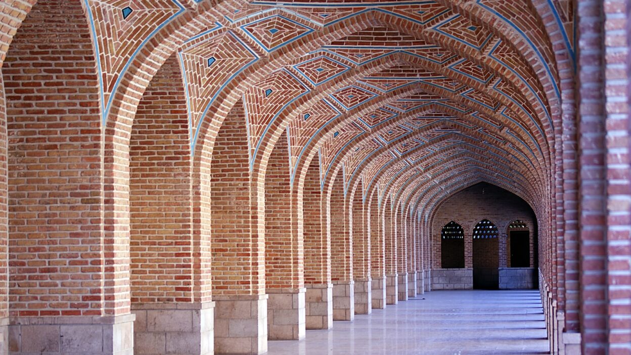 red brick hallway of building