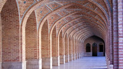 red brick hallway of building