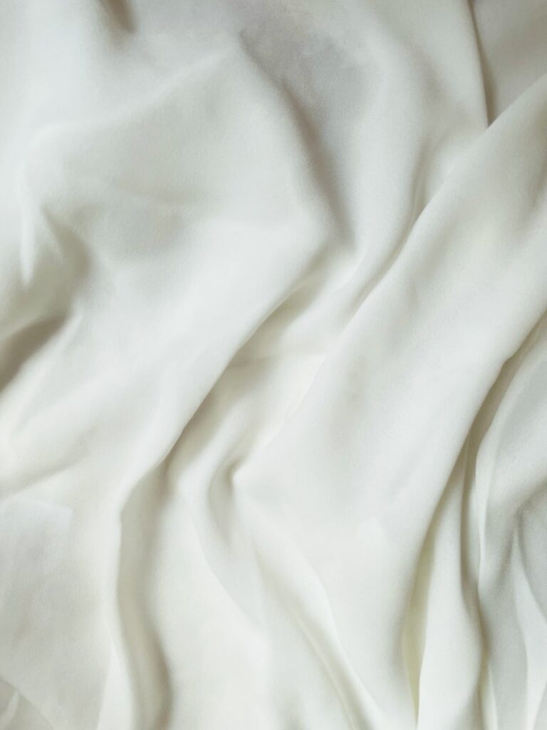 a close up view of a white sheet