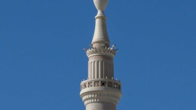 Close-up of a minaret at Al Masjid an Nabawi in Madinah, showcasing Islamic architectural detail.