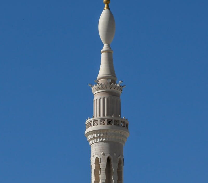 Close-up of a minaret at Al Masjid an Nabawi in Madinah, showcasing Islamic architectural detail.