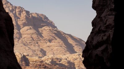 Breathtaking view of Wadi Rum's sandstone formations under a clear sky.